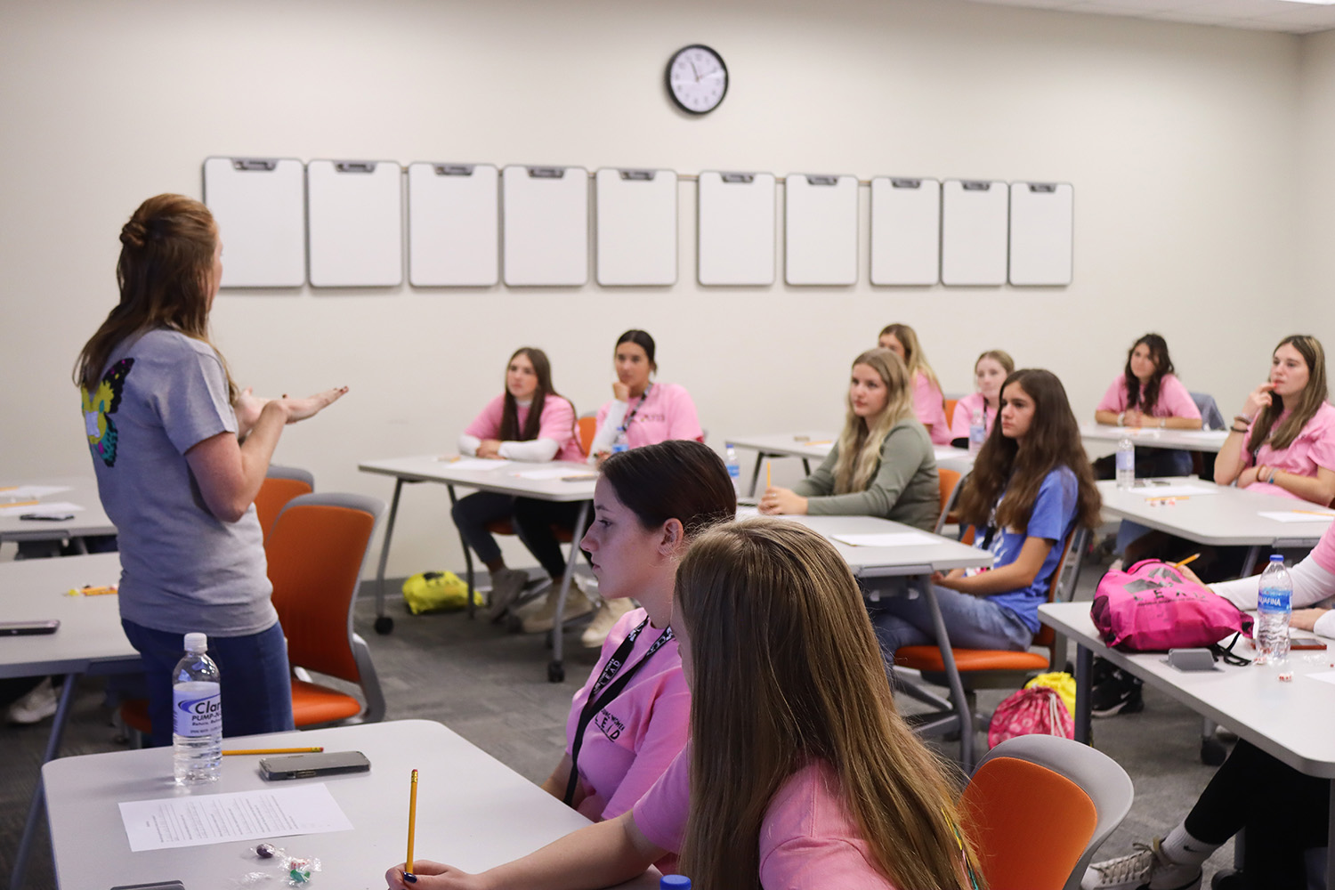 women-speaking-to-high-schoolers-in-classroom