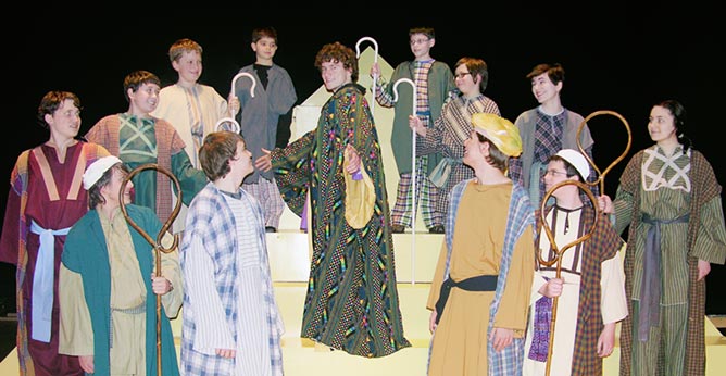 Joseph wears the technicolor dreamcoat during a dress rehersal of Joseph and the Amazing Technicolor Dreamcoat.