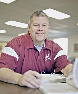 A student in the paramedic program studies in preparation for an exam.