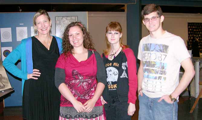Shown at the Art Show from left are Wendy Fosterwelsh, ACTC Assistant Professor of Art, with art students Miranda Ofill from Olive Hill, Jessica K. Howard from Ashland and Michael T. McClure from Flatwoods.